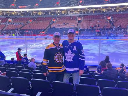 2 brothers at a hockey game