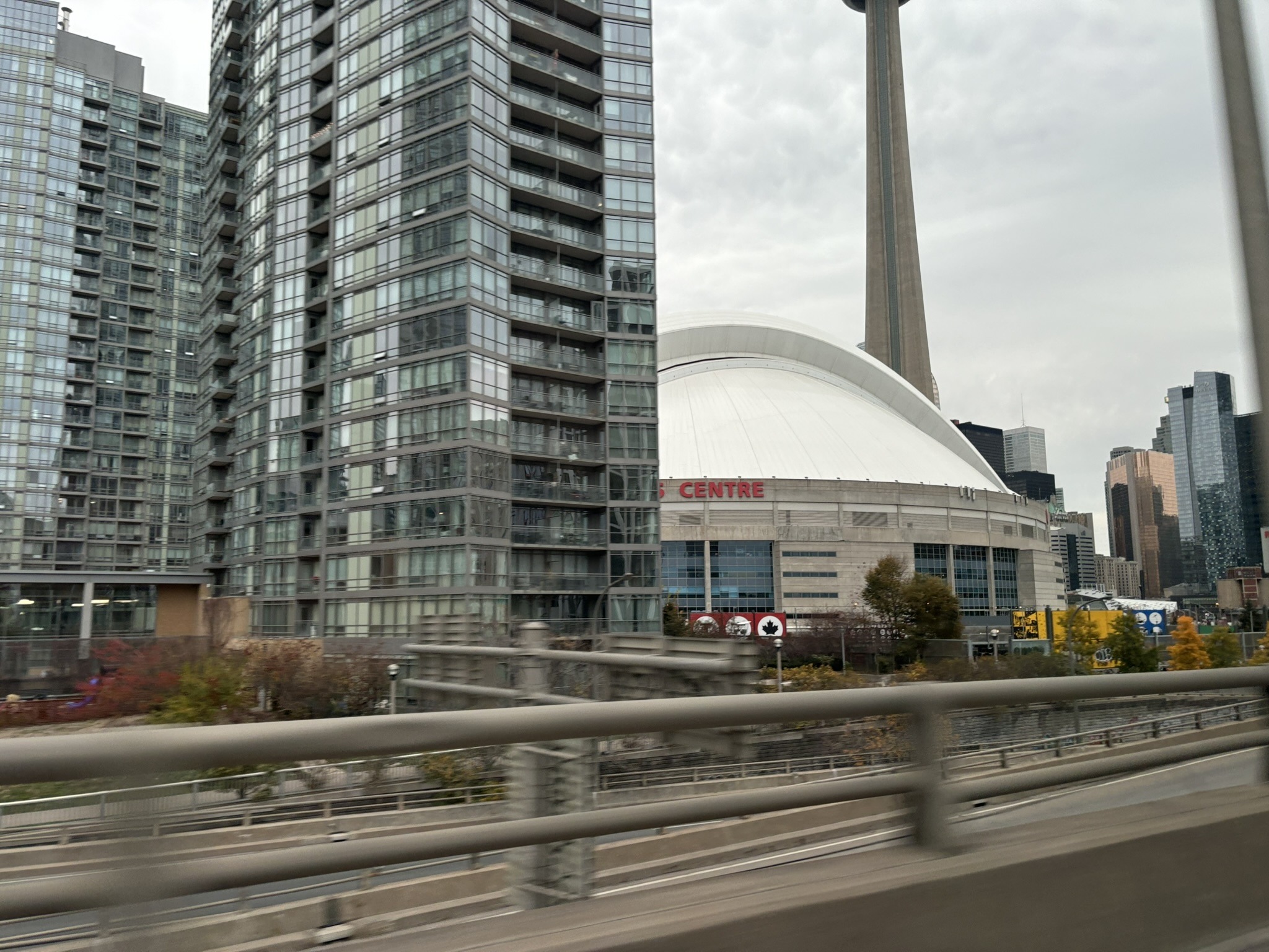 Toronto’s downtown towers, Rogers Centre and CN Tower, viewed from the road.